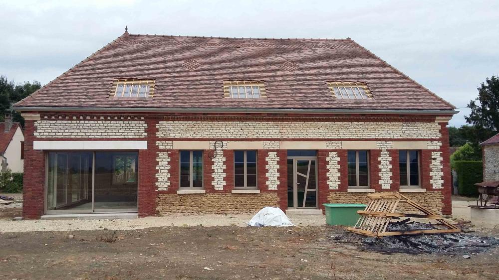 Fenêtres , pote entrée et baies coulissantes en bois -Alu
