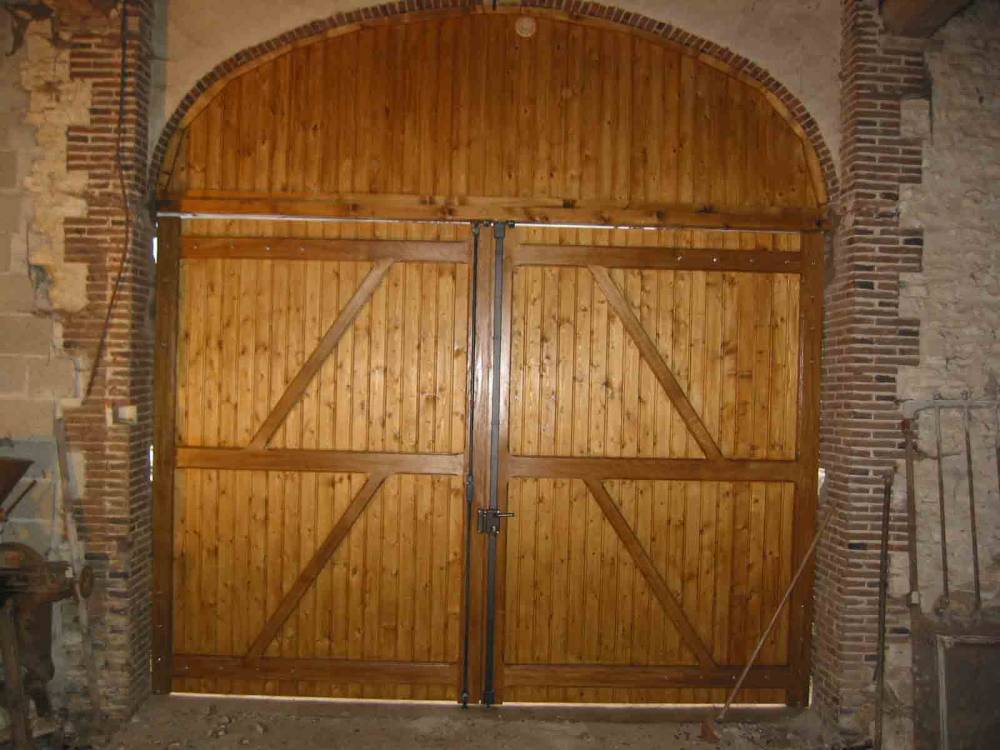 68.Porte de grange double avec imposte arrondi vue intérieur